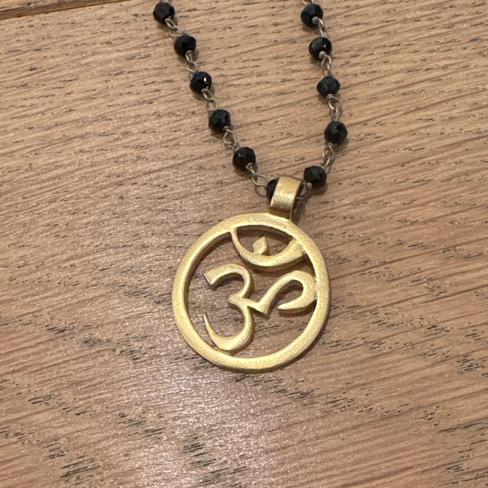 Om Gold and Black Pendant Necklace